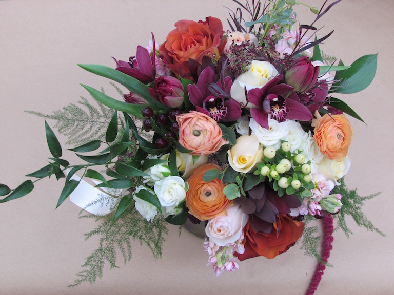 Magenta cymbidiums in a beautiful bridal bouquet