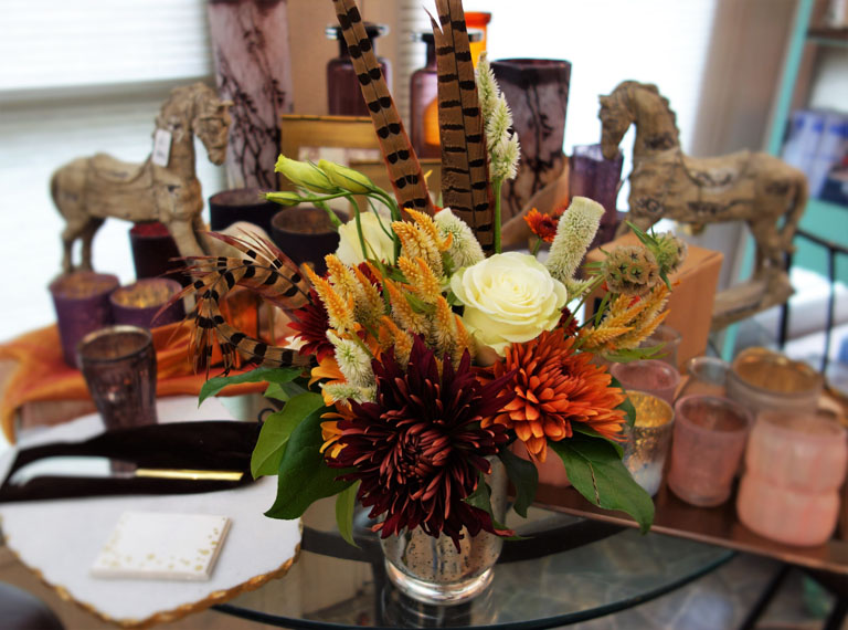 Pheasant feathers, mums and roses
