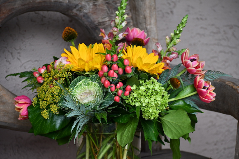 Flowering kale and tulips in a Valentine arrangement
