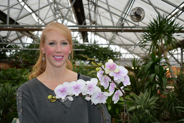 Mandy with a beautiful orchid plant